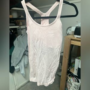 Brand new with tags! Lululemon Ebb to Street Tank in pink. Size 4